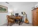 Functional home office with a desk, chair, and storage for a productive workspace at 5685 Palmer Cir # 204, Lakewood Ranch, FL 34211