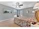 Bedroom with soft carpet, windows, and soft natural light at 5705 Garden Lakes Majestic, Bradenton, FL 34203