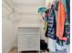 Walk-in closet with ample storage, wire shelving, and a white four-drawer dresser providing organization at 5705 Garden Lakes Majestic, Bradenton, FL 34203
