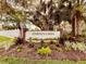 Community entrance sign for Garden Lakes with lush landscaping, creating a welcoming first impression at 5705 Garden Lakes Majestic, Bradenton, FL 34203