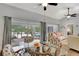 Bright dining area with sliding glass doors leading to the lanai at 5705 Garden Lakes Majestic, Bradenton, FL 34203