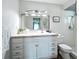 Well-lit bathroom with a spacious vanity, ample storage, and tiled shower at 6012 11Th W Ave, Bradenton, FL 34209