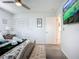 Bright, well-lit bedroom featuring closet and TV at 6012 11Th W Ave, Bradenton, FL 34209