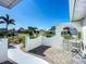 Charming courtyard with seating, lush landscaping, and a brick-paved area at 6012 11Th W Ave, Bradenton, FL 34209