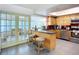 Bright eat-in kitchen with stainless steel appliances and breakfast bar seating at 6012 11Th W Ave, Bradenton, FL 34209