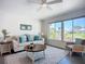 Inviting living room with natural light, cozy seating, and stylish decor at 6012 11Th W Ave, Bradenton, FL 34209