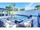 Backyard pool with outdoor seating, perfect for relaxing and entertaining at 6012 11Th W Ave, Bradenton, FL 34209