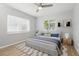 Beautiful bedroom with a large window and simple modern decor at 6116 Rodgers Ave, Sarasota, FL 34231