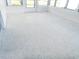 The sun room boasts a terrazzo floor at 6116 Rodgers Ave, Sarasota, FL 34231