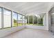This sun room is filled with windows to view the great outdoors at 6116 Rodgers Ave, Sarasota, FL 34231