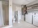 This utility room offers washer, dryer, and shower at 6116 Rodgers Ave, Sarasota, FL 34231