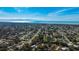 Expansive aerial view highlighting the property's proximity to the coast and surrounding residential area at 620 Burke Rd, Venice, FL 34293