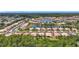 Aerial community view featuring attractive landscaping and a central water feature at 6240 Falcon Lair Dr, North Port, FL 34287