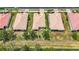 Overhead view showcases the property, landscaping, and surrounding neighborhood at 6240 Falcon Lair Dr, North Port, FL 34287