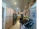 Well-equipped kitchen featuring modern appliances, ample cabinet space, and a breakfast bar with stylish seating at 652 N Elm St, Englewood, FL 34223