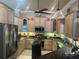 Well-equipped kitchen with granite countertops and stainless steel appliances at 652 N Elm St, Englewood, FL 34223