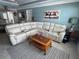 Inviting open concept living room area with comfortable seating and stylish decor at 652 N Elm St, Englewood, FL 34223