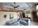 Comfortable living room featuring stylish furnishings, neutral tones, and abundant natural light at 652 N Elm St, Englewood, FL 34223