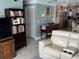 Comfortable living room with direct access to the eat-in kitchen at 652 N Elm St, Englewood, FL 34223