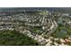 Desirable community aerial highlighting golf course, lakes, and well-maintained landscaping at 6617 Cheswick St, Sarasota, FL 34243