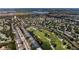 Gorgeous aerial of the community featuring a golf course and multiple water features at 6617 Cheswick St, Sarasota, FL 34243