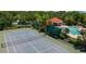 Excellent community featuring a well-maintained tennis court with a net ready for a match at 6617 Cheswick St, Sarasota, FL 34243