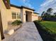 Stunning single-story home features manicured landscaping, a modern walkway, and a welcoming entrance at 6875 Beckwith Ave, North Port, FL 34291