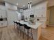Bright and airy kitchen with a spacious island, modern appliances, and ample cabinet space at 6875 Beckwith Ave, North Port, FL 34291