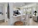 Kitchen breakfast nook with white counter seating and stainless steel appliances at 7019 River Hammock Dr # 306, Bradenton, FL 34212