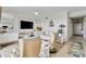 Comfortable living room with stylish decor and an entertainment center at 7019 River Hammock Dr # 306, Bradenton, FL 34212