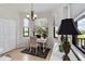 Bright office nook with a desk, chair, and large windows offering scenic views at 7019 River Hammock Dr # 306, Bradenton, FL 34212