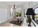 Bright office nook with a desk, chair, and large windows offering scenic views at 7019 River Hammock Dr # 306, Bradenton, FL 34212