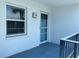Up-close entry features include storm door, secure windows, and unit number 725 at 725 Capri Isles Blvd # 217, Venice, FL 34292