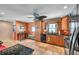 Spacious kitchen featuring wood cabinetry, modern appliances, and tile flooring at 7508 9Th N Ave, St Petersburg, FL 33710