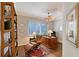 Well-appointed office with a classic wooden desk, leather chair, and a cozy rug at 7728 Club Ln, Sarasota, FL 34238
