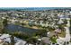 Stunning aerial view of a coastal community with waterfront homes, lush landscaping, and easy access to the ocean at 8808 44Th Avenue W Dr, Bradenton, FL 34210