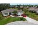 Charming single-story home featuring a well-manicured lawn, modern driveway, and attached garage at 8808 44Th Avenue W Dr, Bradenton, FL 34210