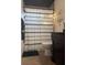 Bathroom featuring a shower with patterned curtain and dark wood vanity with black counter and a plant at 10827 Village Green Ave, Seminole, FL 33772