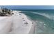 Beautiful beach with clear waters, a sandy shoreline, and people enjoying the sunny weather at 111 Whispering Sands Cir # V38, Sarasota, FL 34242