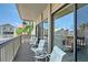 Relaxing condo balcony with seating overlooking the beautiful landscape at 1159 Lake House Cir # C120, Sarasota, FL 34242