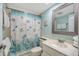 Bathroom featuring a single sink vanity and decorative shower curtain at 1159 Lake House Cir # C120, Sarasota, FL 34242