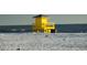 A yellow lifeguard stand on Siesta Key beach at 1159 Lake House Cir # C120, Sarasota, FL 34242