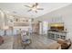 Well-lit living room featuring an open floor plan and neutral decor at 1159 Lake House Cir # C120, Sarasota, FL 34242