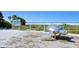 Siesta Key beach sign and decorative sea turtle statue on the white sands at 1159 Lake House Cir # C120, Sarasota, FL 34242