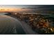 Breathtaking aerial view of beachside cityscape with lights at sunset at 1212 Benjamin Franklin Dr # 909, Sarasota, FL 34236