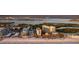 Aerial of luxury beachfront condos offering prime location, water views and upscale coastal living at 1212 Benjamin Franklin Dr # 909, Sarasota, FL 34236
