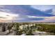 Beautiful building with a skyline view and sunset clouds at 1212 Benjamin Franklin Dr # 909, Sarasota, FL 34236