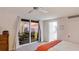 Unwind on the balcony showcasing water views and bedroom access at 1212 Benjamin Franklin Dr # 909, Sarasota, FL 34236