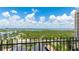 Balcony offers panoramic views of the ocean, the city skyline, and lush greenery at 1212 Benjamin Franklin Dr # 909, Sarasota, FL 34236