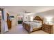 Inviting bedroom with balcony access, water views, and coastal-themed decor, creating a relaxing retreat at 1212 Benjamin Franklin Dr # 909, Sarasota, FL 34236
